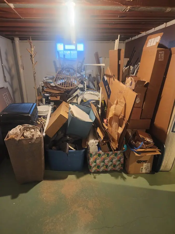 Roll-off dumpster container at job site for 20 Yard Dumpster Rental in West Gardiner